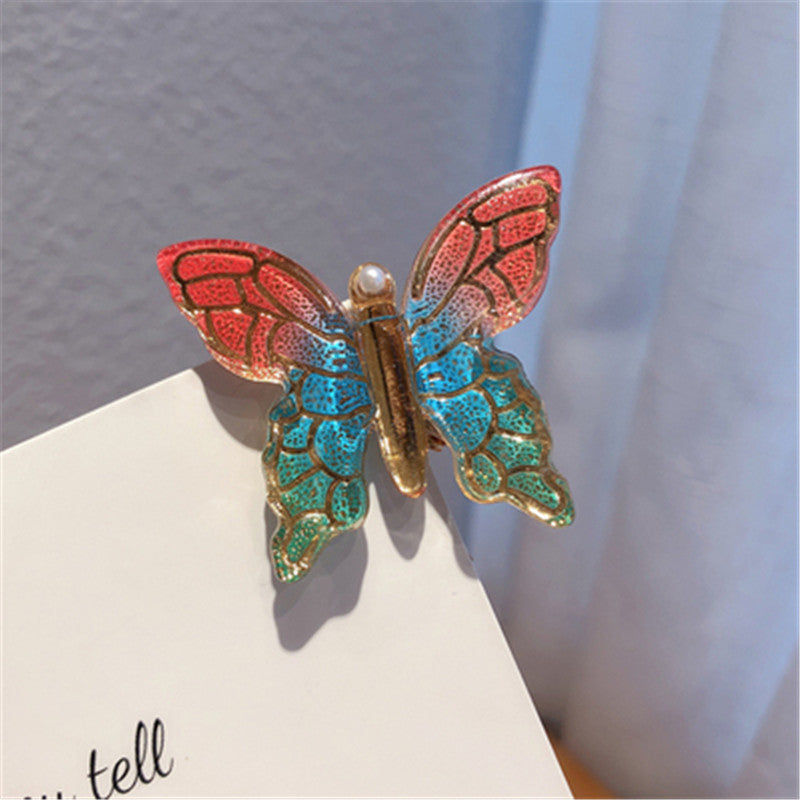Pince à cheveux papillon colorée, accessoire de coiffure simple et élégant \ Color Butterfly Hairpin Simple Temperament Clip Headdress Hair Accessories